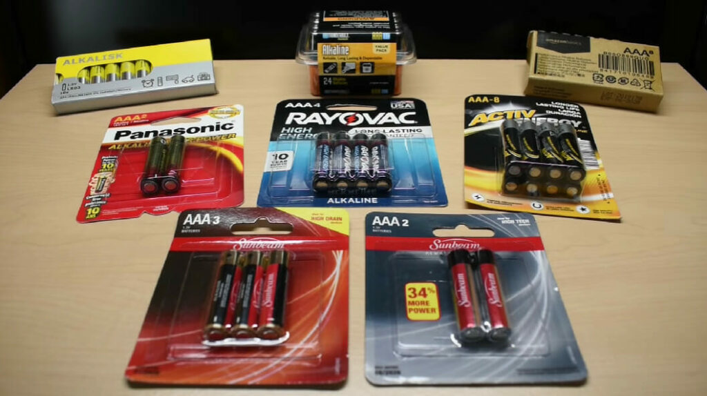 different brands of an aaa batteries laid on the table