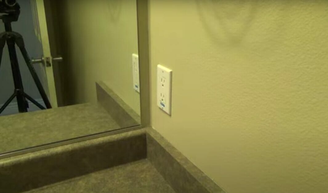 two-prong outlet without reset button at the bathroom