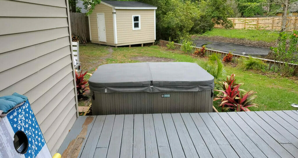 an outdoor hot tub covered