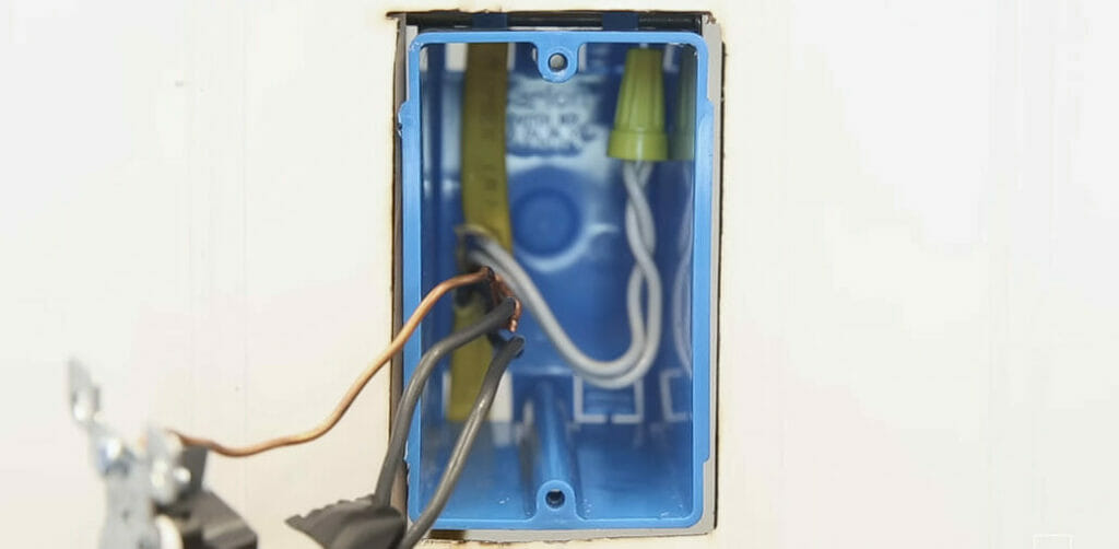 an undone electrical blue box