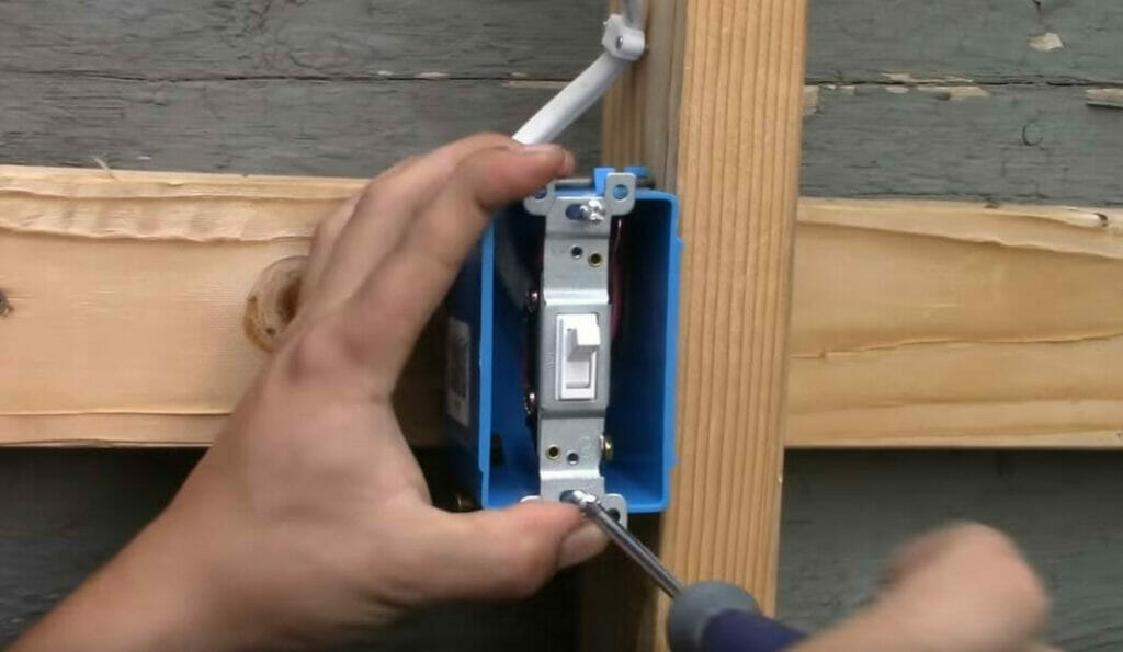 attaching the switch to the blue electrical box