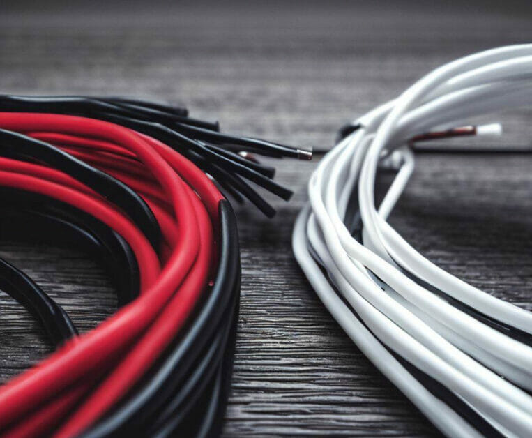 red-black and white rolled wires