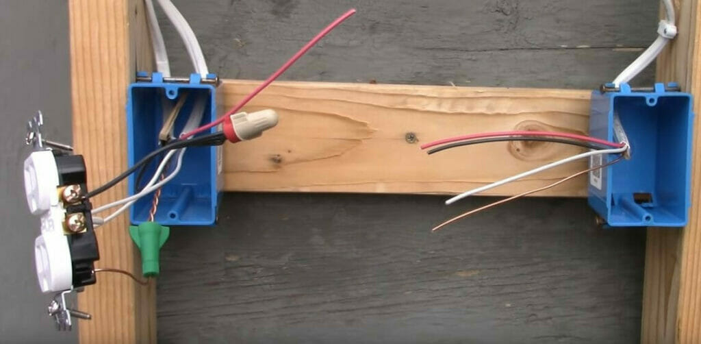 splicing the two hot wires by putting a wire cap over their ends