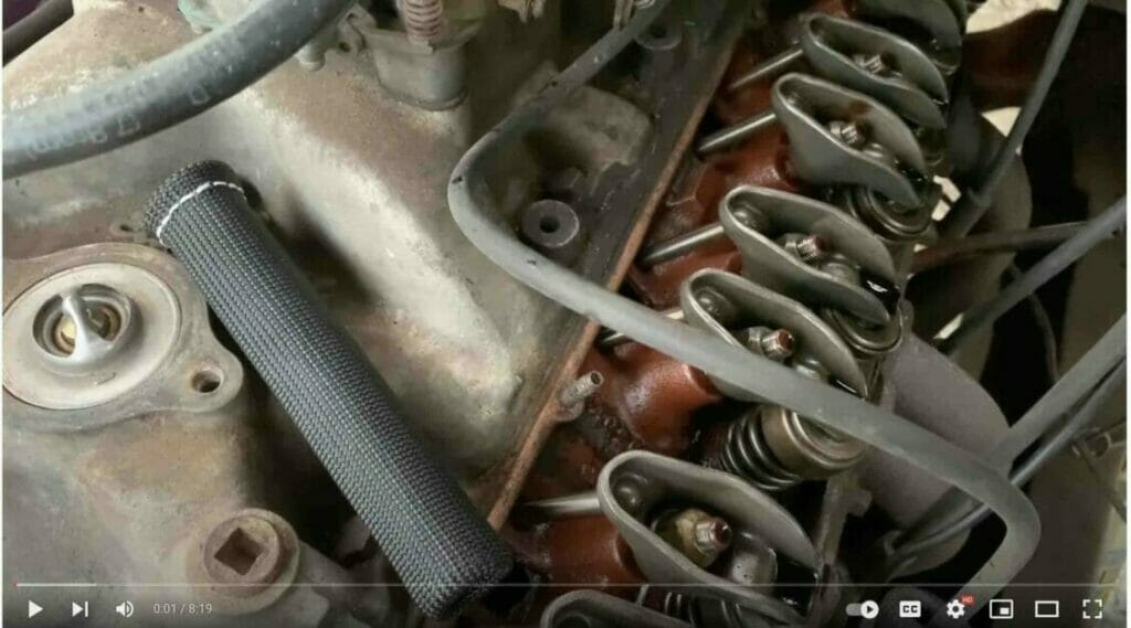 A close up video demonstrating an easy method for installing spark plug wire heat shields.