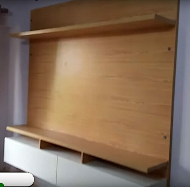 A TV cabinet with hidden wire management capabilities