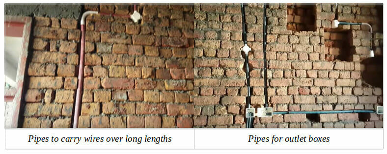 a wire concealment process done on a brick wall