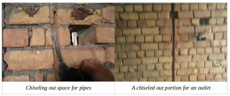 an undone process of hiding wires on brick wall