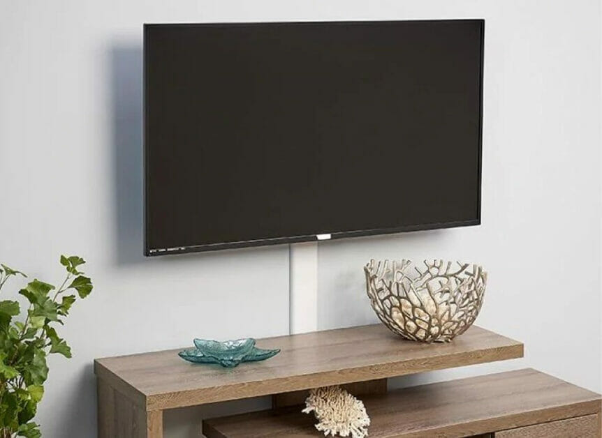 A wooden stand for a flat screen TV with wire hiding capabilities