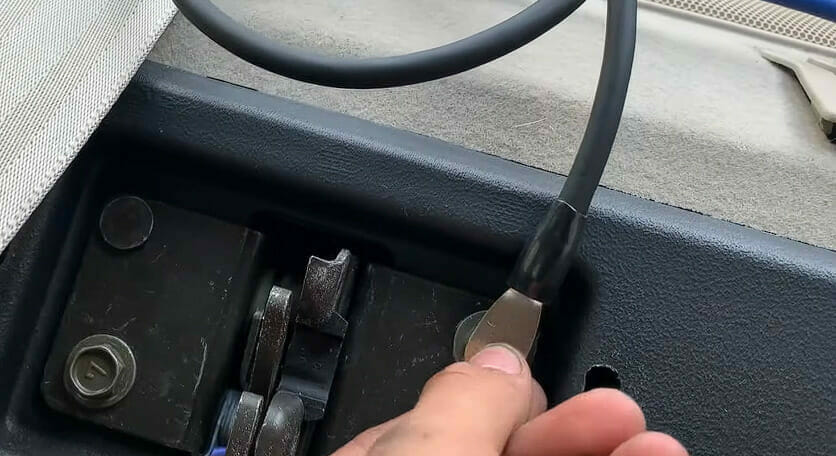 A person connecting the wire from a receiver to a metal point