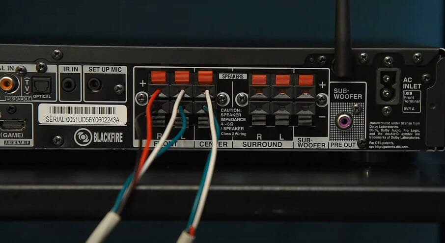 A close up look at the speaker's receiver with wires in it