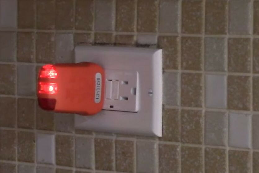 testing voltage with voltage tester on the newly installed GFCI Outlet