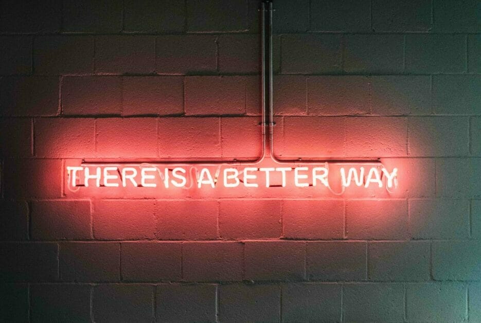 THERE IS A BETTER WAY neon sign on the wall