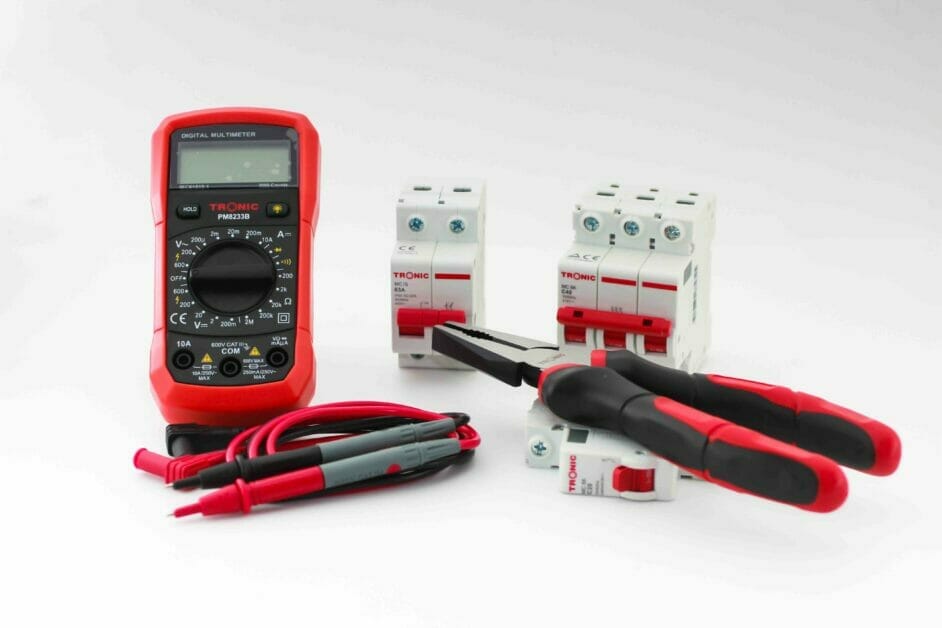 Tronic digital multimeter, a couple of circuit breakes and a plier