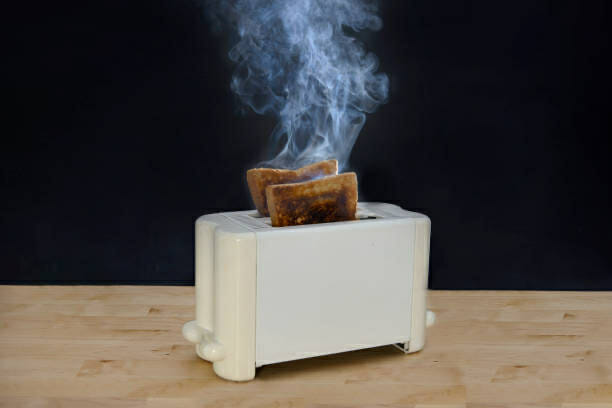 burnt bread toast in a bread toaster