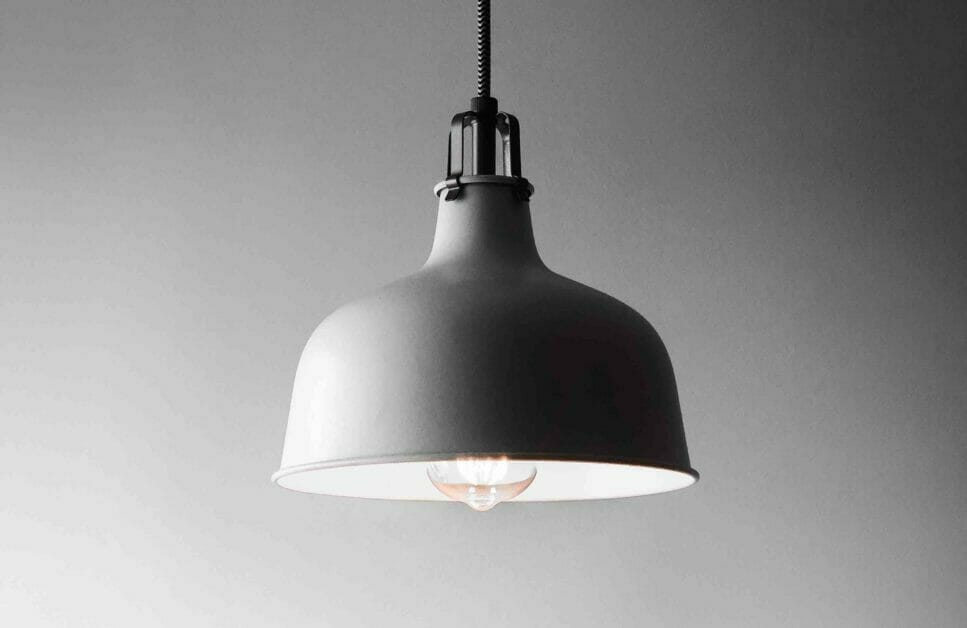 A pendant light hanging from a wall.