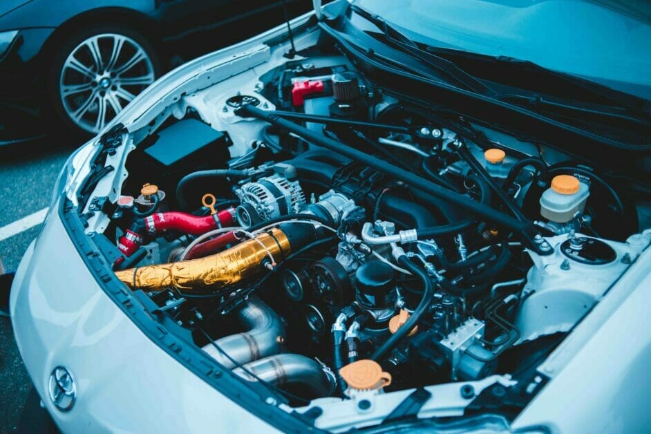 An engine of a car in an open car hood