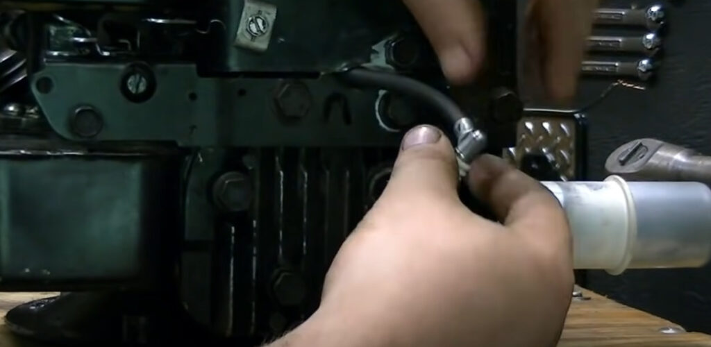 A person holding the spark plug wires