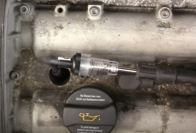 A closer look at the spark plug at an engine