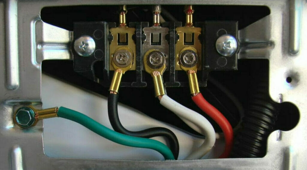A box with wires and wires in it used for wiring a dryer plug.