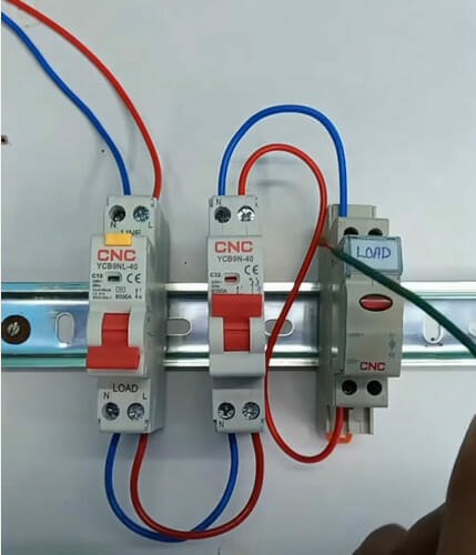 a blue and red wires connected to three circuit breaker