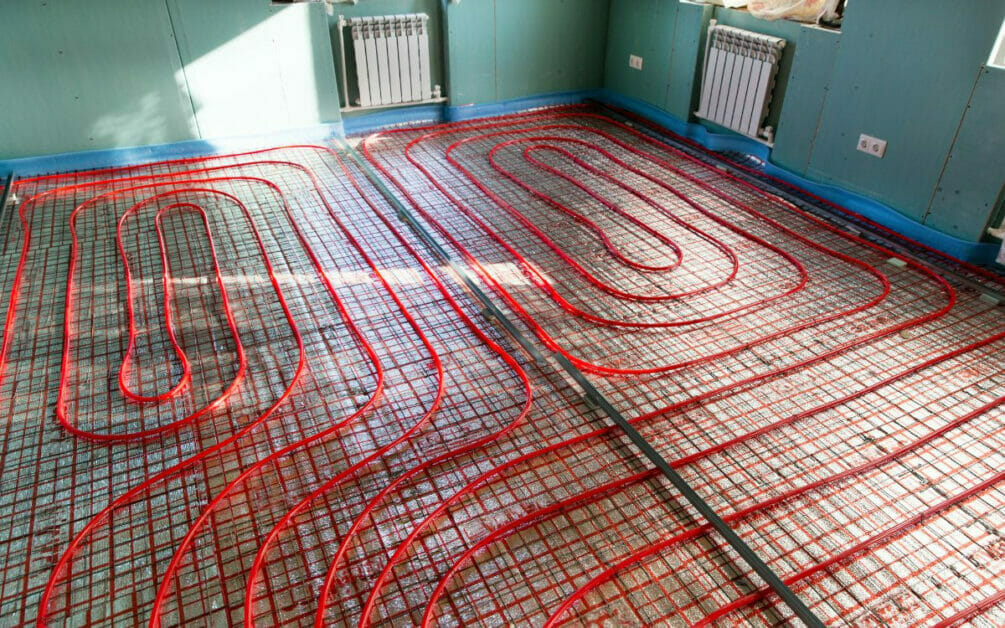 A room with a heated floor that uses red wires.