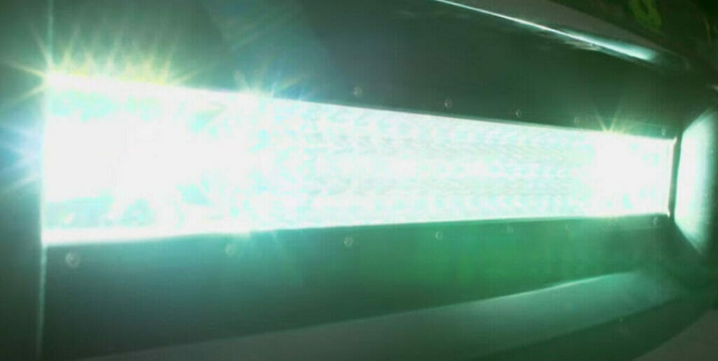 A close up of a led light bar in a dark room