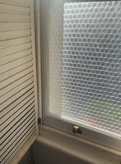 A plastic covering a window