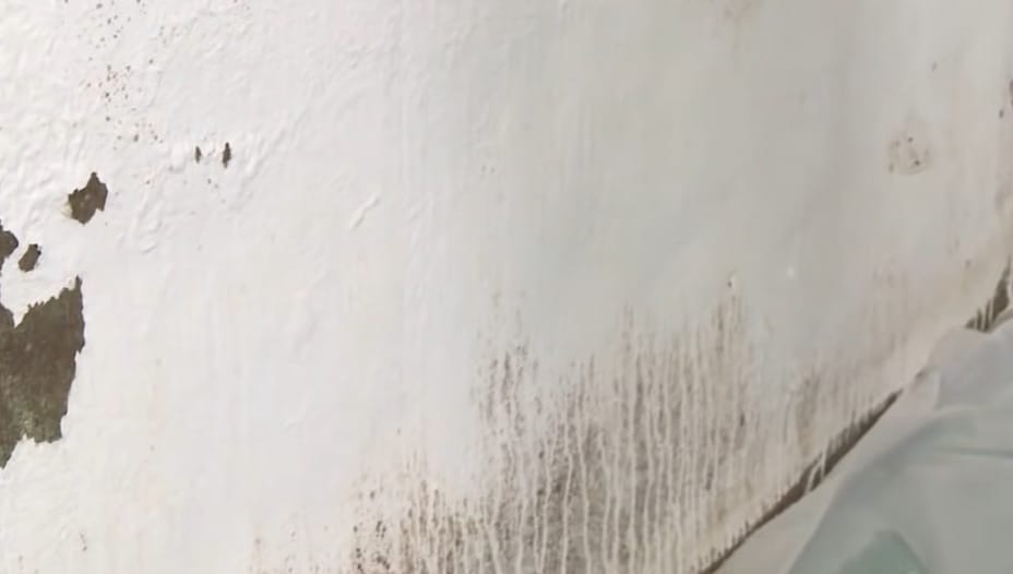 A dirty white wall