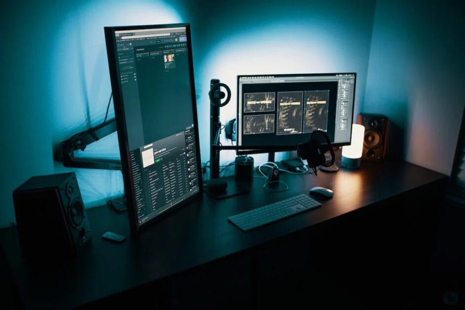 A well lit workstation with horizontal and vertical desktops
