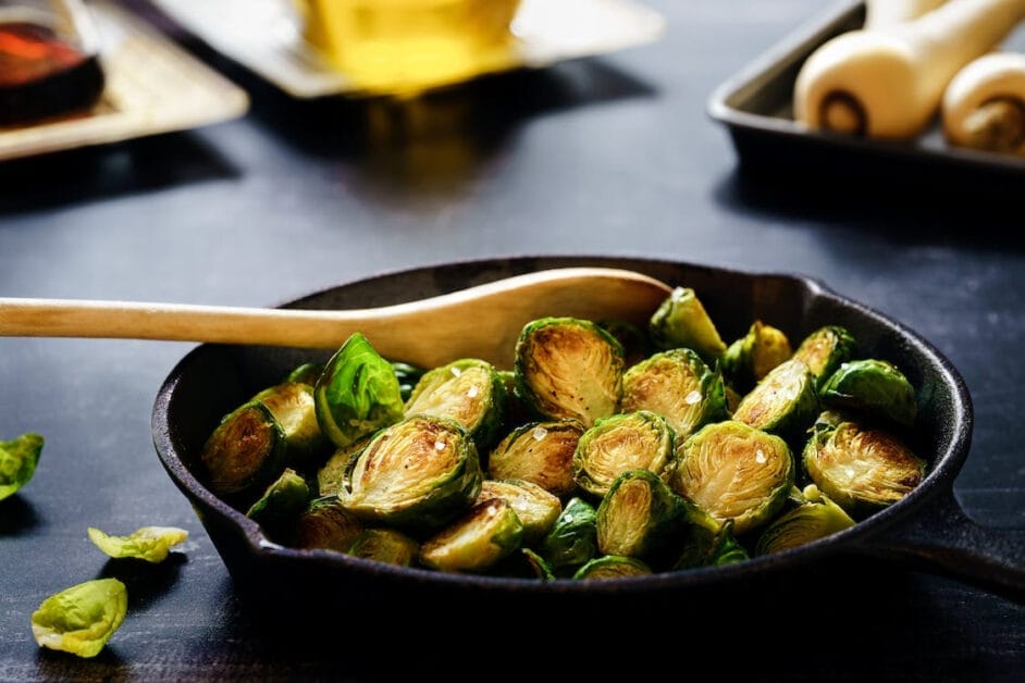 Roasted brussels sprouts in a cast iron skillet