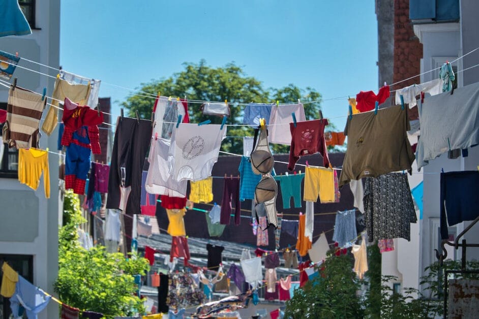 A washed clothe hanging at the string outside of each homes