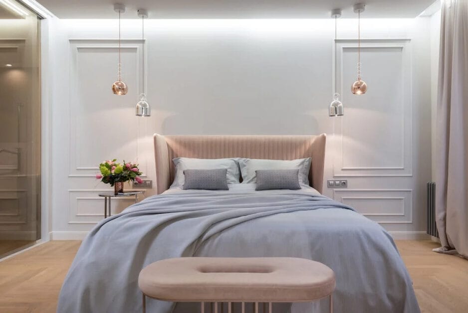 A white, cream and gray color of a bedroom