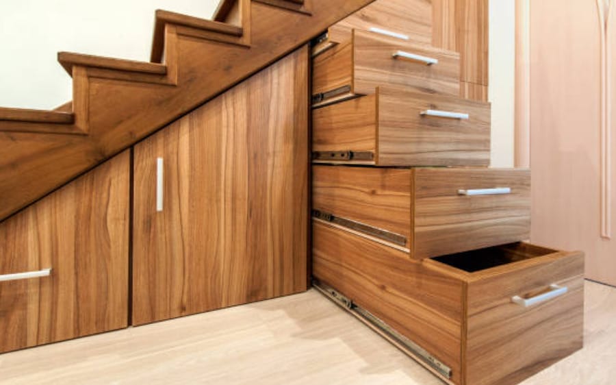 An ingenious wooden staircase with built-in drawers