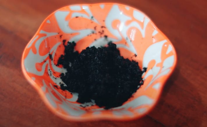 A natural black ground coffee in a printed bowl