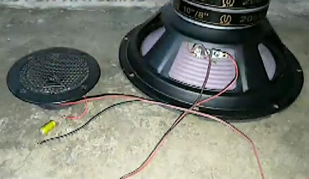 A speaker wired to tweeters on the ground