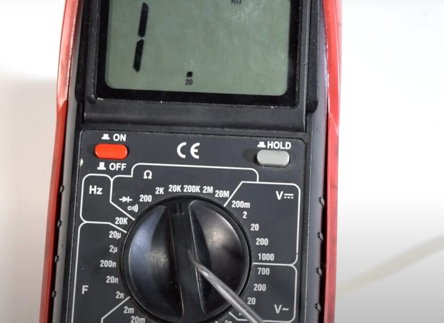 A multimeter at 1 reading