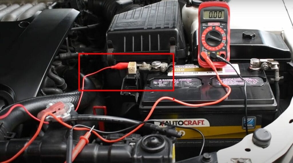 Connecting the multimeter into the car's battery