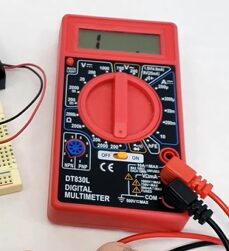 A multimeter at 1 reading
