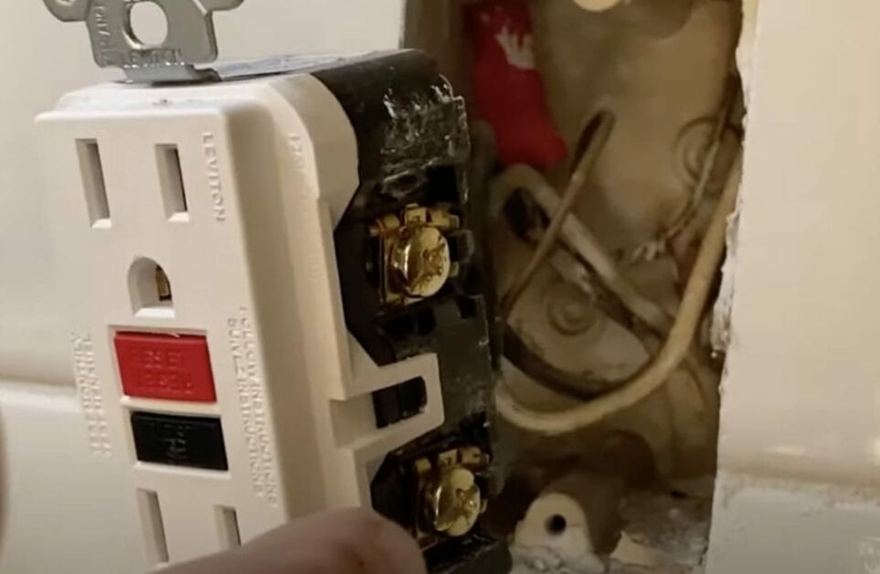 A person getting out the outlet from the wall