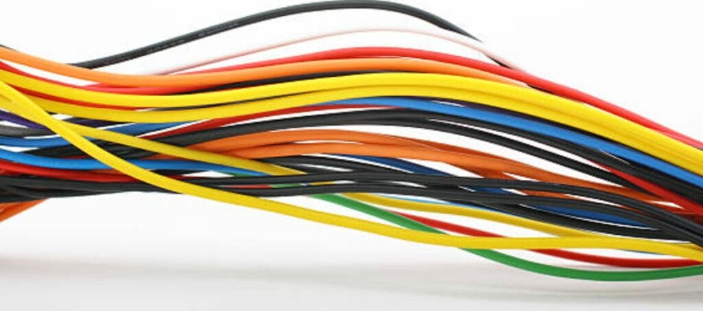 A bunch of colored wires on a white background