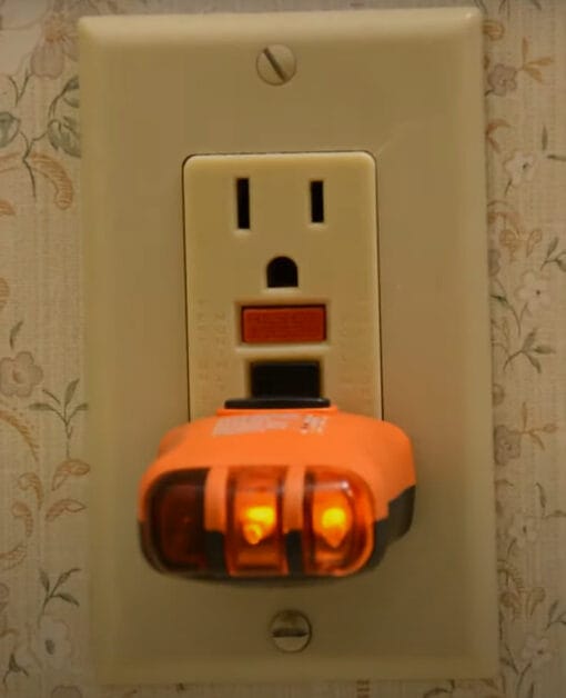 The outlet tester gives off light