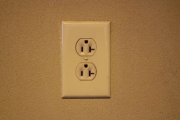A wall outlet features two convenient outlets