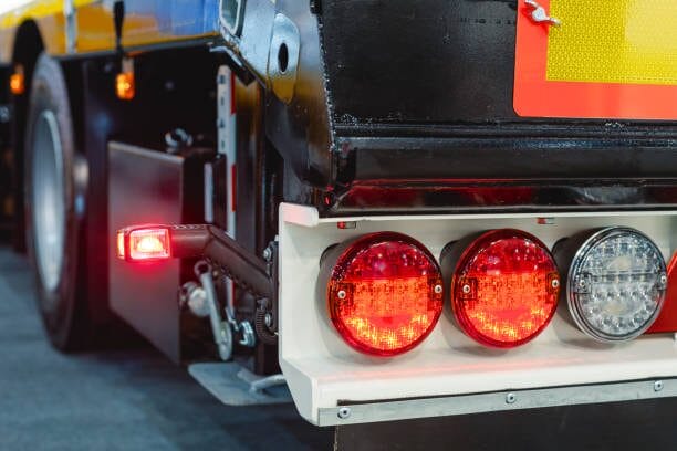 A close up of the tail lights of a truck