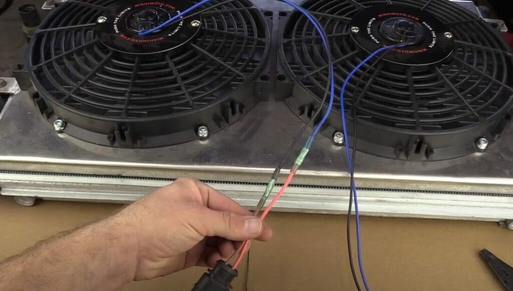 Installing wires to a cooling fan on a car